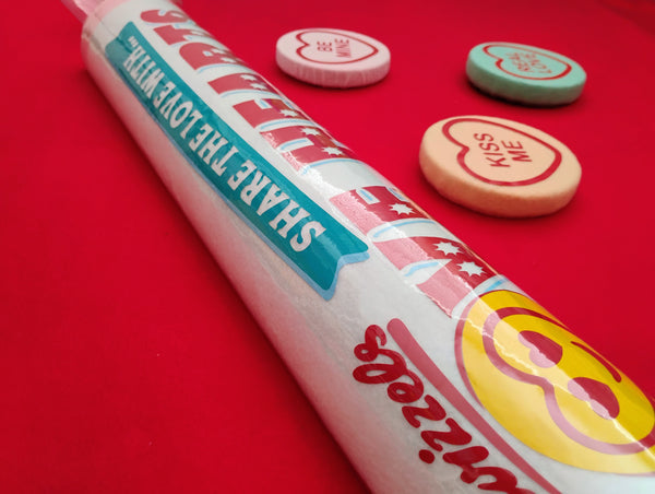 Candy Hearts with 'Share the Love' text on a red background