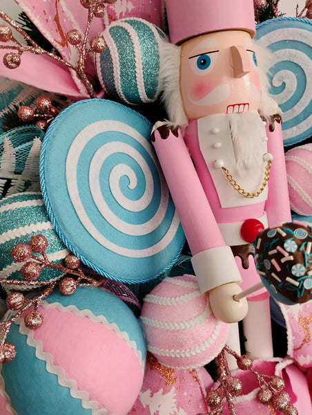 Decorative nutcracker with candy-themed decorations