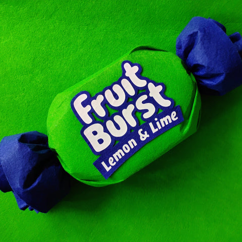 Fruit Burst Lemon & Lime candy on a green background